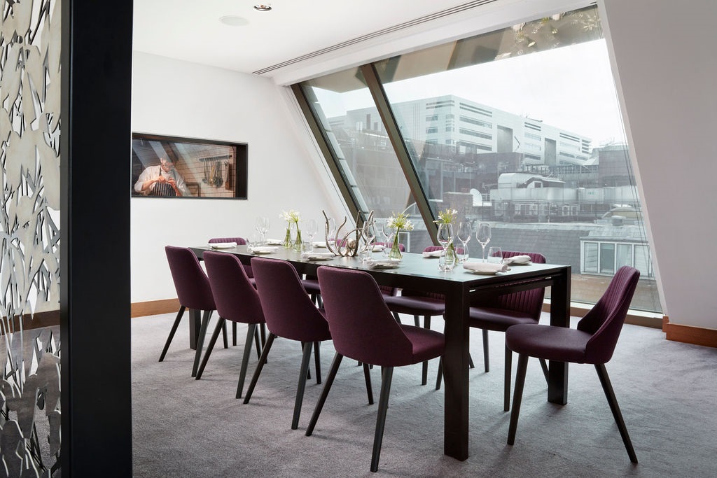 Chef's Table dining room with panoramic windows at Angler